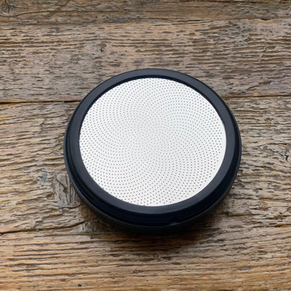 ATMOS ELECTRIC VACUUM CANISTER lid featuring a sleek design with holes for efficient sealing.